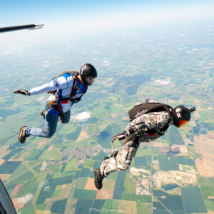 Two skydivers jumping from a plane 